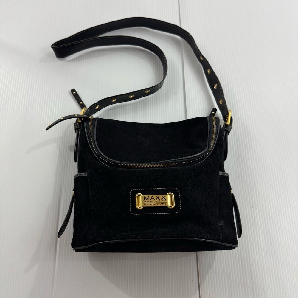 31. Women’s Maxx New York Black & gold purse‎